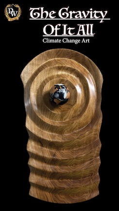  The Gravity Of it all sculpture represents the planet earth and gravity waves carved out of Butternut wood